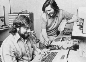 Steve Jobs and Steve Wozniak working on BASIC programming on the Apple II.